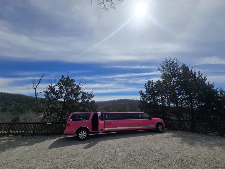 Pinkey the pink limo at sunset — prom and spring event limo service Springfield MO