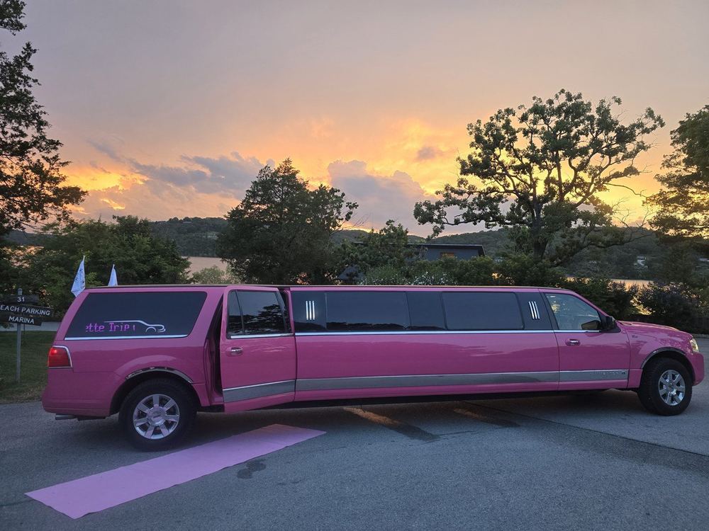 Pink carpet rolled out to Pinkey the limo at sunset